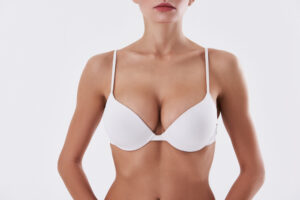 Woman in bra with gummy bear implants in Savannah, GA
